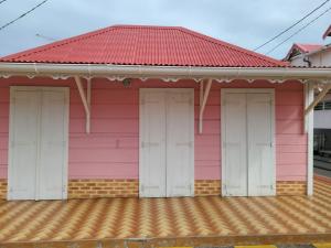 Pink house and white doors
